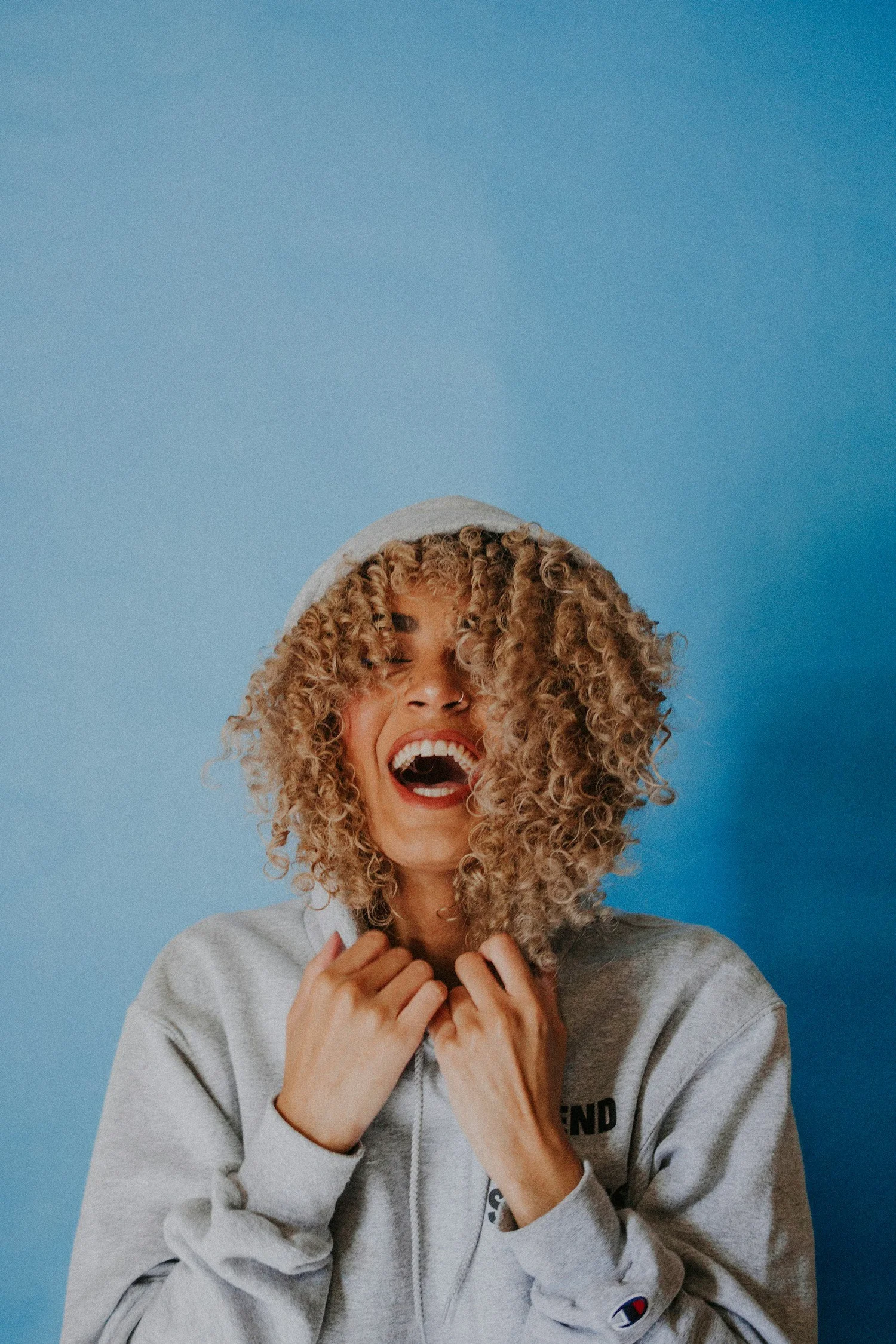 A woman laughing with joy